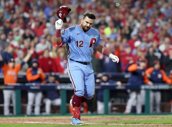 Phillies left fielder Kyle Schwarber slams his helmet after Astros first baseman Trey Mancini robs him of a game-tying hit.